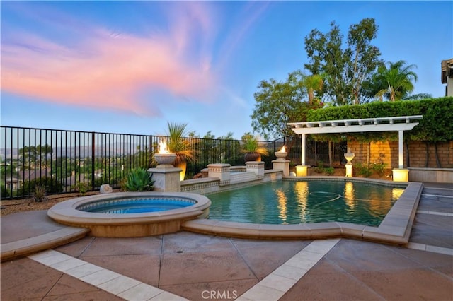 4451 Birdie Dr, Corona, CA 92883 - pool at dusk featuring a pool with connected hot tub and a patio