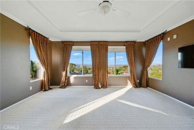 4451 Birdie Dr, Corona, CA 92883 - carpeted spare room with a raised ceiling, ceiling fan, and ornamental molding