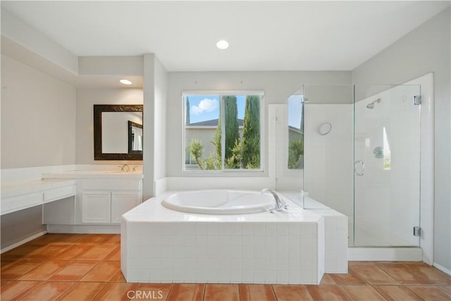 4451 Birdie Dr, Corona, CA 92883 - full bathroom featuring vanity, a garden tub, tile patterned floors, a stall shower, and recessed lighting