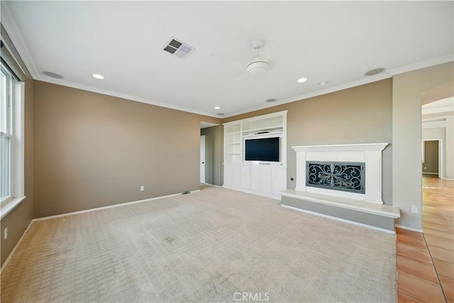 4451 Birdie Dr, Corona, CA 92883 - unfurnished living room featuring recessed lighting, healthy amount of natural light, ornamental molding, and a fireplace with raised hearth