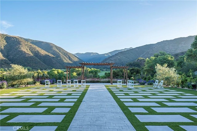 4451 Birdie Dr, Corona, CA 92883 - view of community featuring a pergola and a mountain view