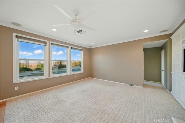4451 Birdie Dr, Corona, CA 92883 - spare room featuring ornamental molding, ceiling fan, recessed lighting, and light carpet