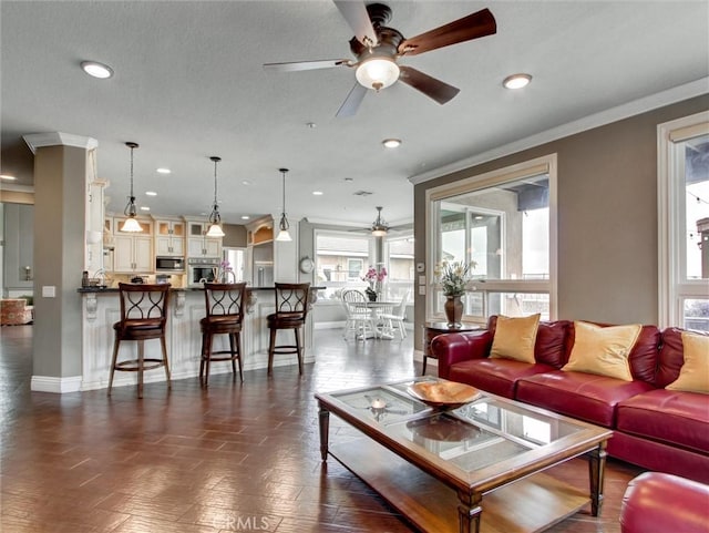 27020 Daisy Cir, Yorba Linda, CA 92887 - living area with ceiling fan, healthy amount of natural light, crown molding, and recessed lighting