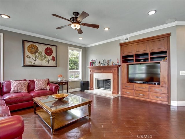 27020 Daisy Cir, Yorba Linda, CA 92887 - living room with ceiling fan, recessed lighting, a premium fireplace, crown molding, and dark wood-type flooring