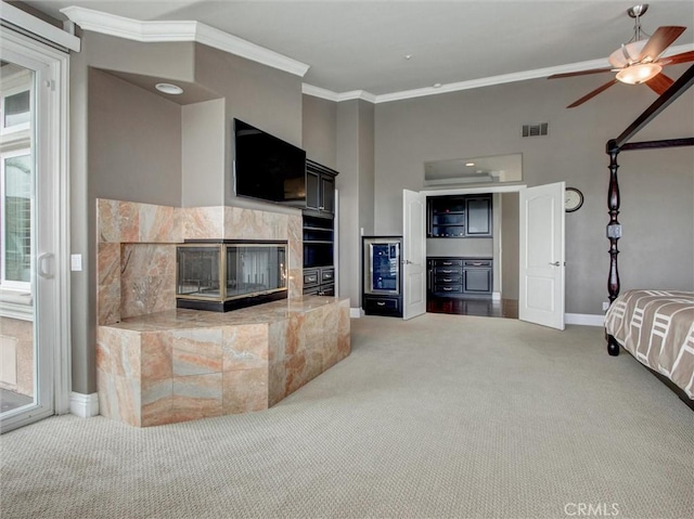 27020 Daisy Cir, Yorba Linda, CA 92887 - living room featuring carpet, ornamental molding, ceiling fan, and a tile fireplace