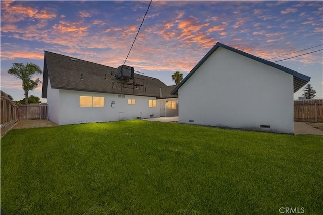 3009 Delburn St, Bakersfield, CA 93304 - rear view of house featuring a fenced backyard, a patio area, stucco siding, roof with shingles, and crawl space