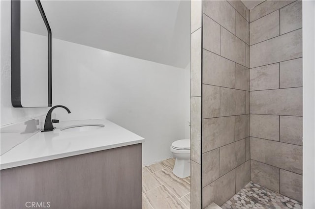 3009 Delburn St, Bakersfield, CA 93304 - bathroom featuring vanity and tiled shower