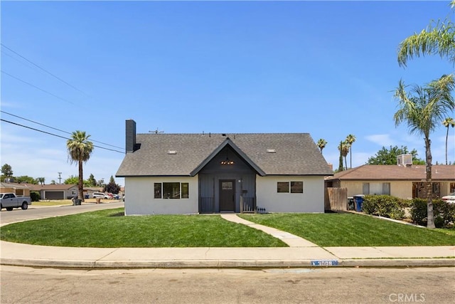 3009 Delburn St, Bakersfield, CA 93304 - view of front of house featuring a front lawn and roof with shingles