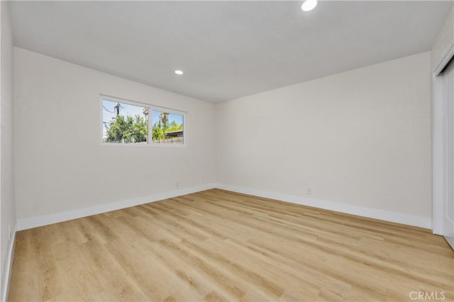 3009 Delburn St, Bakersfield, CA 93304 - empty room with recessed lighting and light wood-style flooring