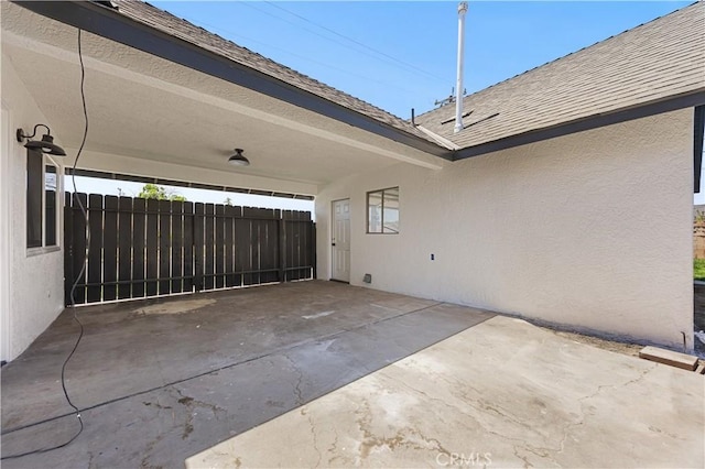 3009 Delburn St, Bakersfield, CA 93304 - view of patio featuring an attached carport