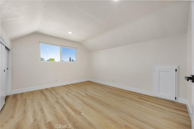 3009 Delburn St, Bakersfield, CA 93304 - additional living space with vaulted ceiling, light wood-style flooring, and recessed lighting