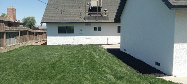 3009 Delburn St, Bakersfield, CA 93304 - back of property featuring stucco siding and roof with shingles