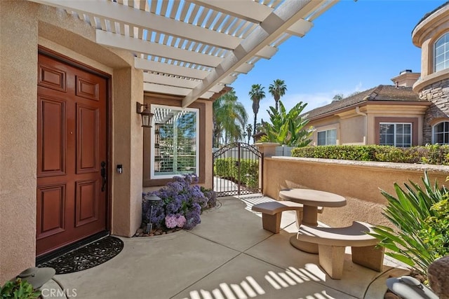 29530 Winding Brook Dr, Menifee, CA 92584 - view of patio / terrace with a gate and a pergola