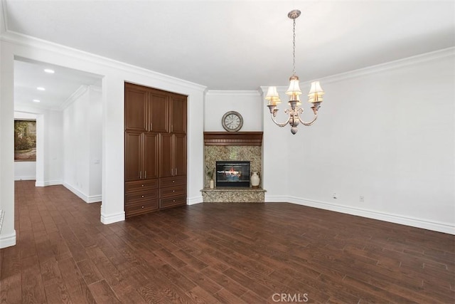 29530 Winding Brook Dr, Menifee, CA 92584 - unfurnished living room featuring a chandelier, ornamental molding, dark wood-type flooring, and a fireplace