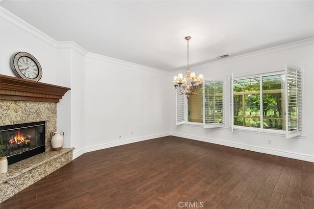29530 Winding Brook Dr, Menifee, CA 92584 - unfurnished dining area featuring dark wood-style floors, ornamental molding, a chandelier, and a high end fireplace