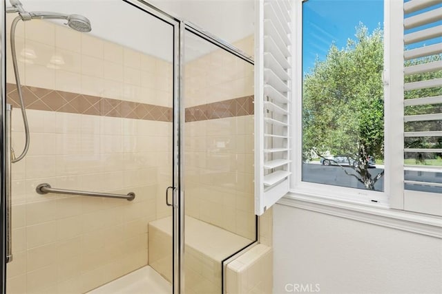 29530 Winding Brook Dr, Menifee, CA 92584 - bathroom featuring a shower stall and plenty of natural light