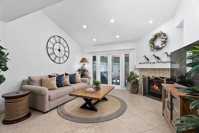 50 Niguel Pointe Dr Unit 118, Laguna Niguel, CA 92677 - living area with a tiled fireplace, light tile patterned floors, recessed lighting, and vaulted ceiling