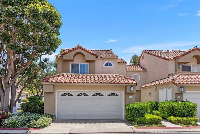 50 Niguel Pointe Dr Unit 118, Laguna Niguel, CA 92677 - mediterranean / spanish home with concrete driveway, stucco siding, and a tiled roof