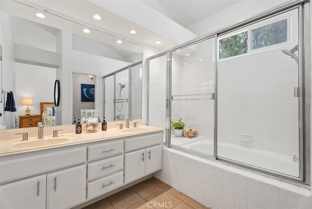50 Niguel Pointe Dr Unit 118, Laguna Niguel, CA 92677 - bathroom featuring double vanity, tiled shower / bath combo, tile patterned flooring, and recessed lighting