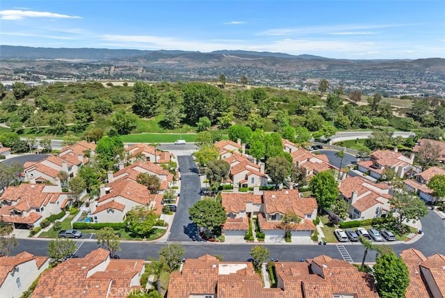 50 Niguel Pointe Dr Unit 118, Laguna Niguel, CA 92677 - aerial view of property and surrounding area with nearby suburban area and a mountainous background