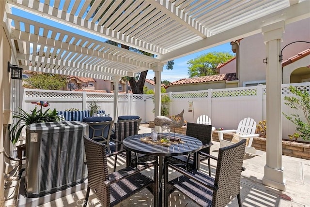 50 Niguel Pointe Dr Unit 118, Laguna Niguel, CA 92677 - fenced backyard featuring outdoor dining space, a patio, and a pergola