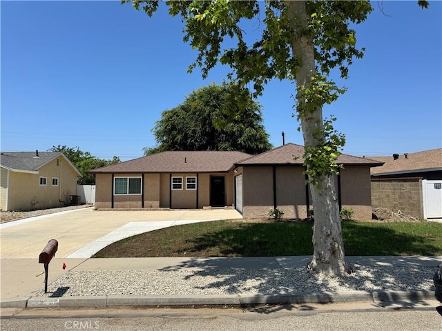 1343 Cherry Ave, Simi Valley, CA 93065 - ranch-style house featuring driveway and stucco siding