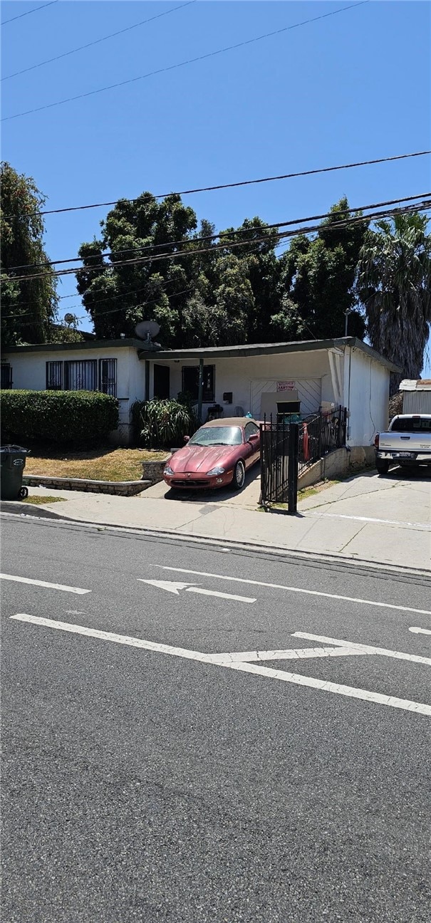 1108 W 120th St, Los Angeles, CA 90044 - view of front facade with driveway