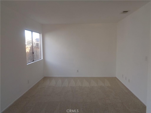 3407 Amber St, Rosamond, CA 93560 - unfurnished room with light colored carpet and baseboards
