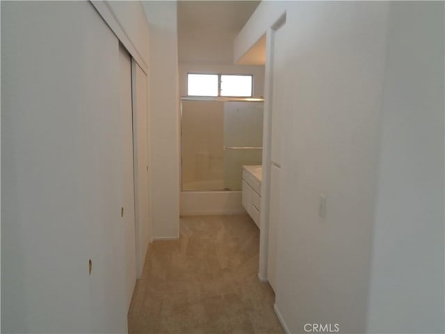 3407 Amber St, Rosamond, CA 93560 - corridor featuring light colored carpet and baseboards