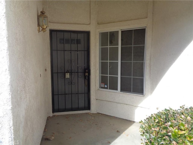3407 Amber St, Rosamond, CA 93560 - property entrance featuring stucco siding