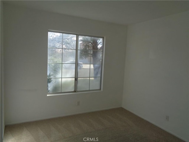 3407 Amber St, Rosamond, CA 93560 - spare room with carpet floors and healthy amount of natural light
