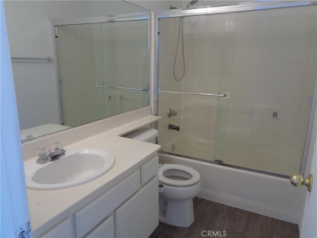 3407 Amber St, Rosamond, CA 93560 - full bathroom with vanity, combined bath / shower with glass door, and wood finished floors