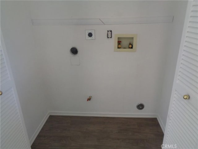 3407 Amber St, Rosamond, CA 93560 - laundry area featuring hookup for an electric dryer, dark wood finished floors, washer hookup, and hookup for a gas dryer