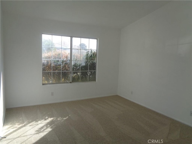 3407 Amber St, Rosamond, CA 93560 - carpeted spare room featuring baseboards