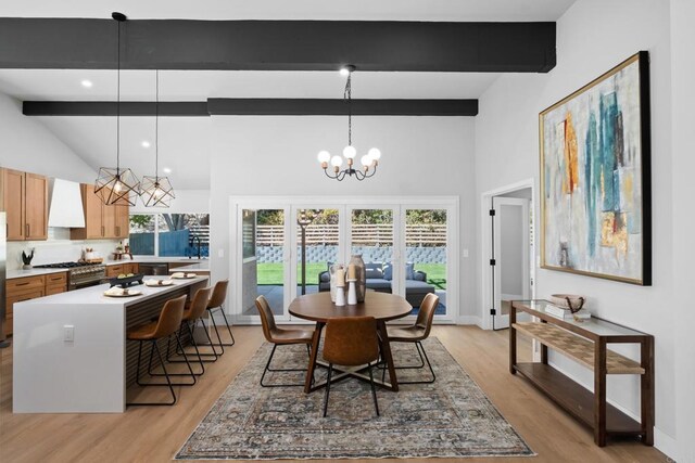 10594 Rookwood Dr, San Diego, CA 92131 - dining space featuring a chandelier, beam ceiling, high vaulted ceiling, and light wood finished floors