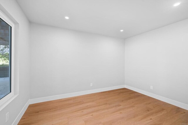 10594 Rookwood Dr, San Diego, CA 92131 - unfurnished room with recessed lighting and light wood-style floors