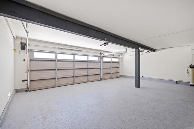 10594 Rookwood Dr, San Diego, CA 92131 - garage featuring baseboards