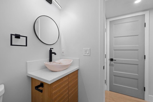 10594 Rookwood Dr, San Diego, CA 92131 - bathroom with vanity and wood finished floors
