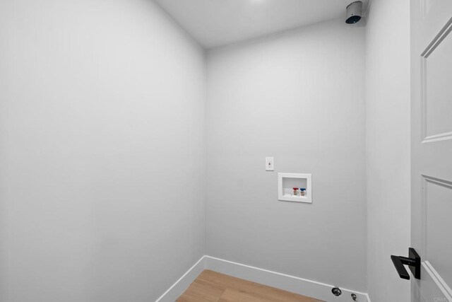 10594 Rookwood Dr, San Diego, CA 92131 - laundry area featuring hookup for a washing machine and light wood-style flooring