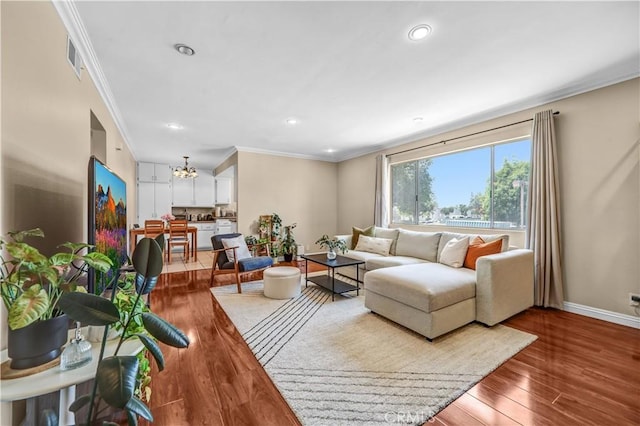 1821 Pepper St Unit 3, Alhambra, CA 91801 - living area featuring a chandelier, crown molding, wood finished floors, and recessed lighting