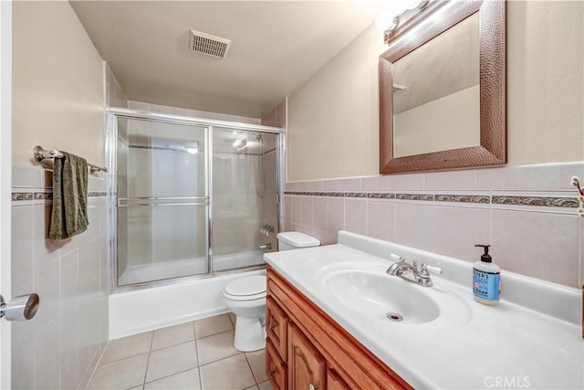 1821 Pepper St Unit 3, Alhambra, CA 91801 - bathroom featuring tile walls, vanity, combined bath / shower with glass door, and tile patterned floors