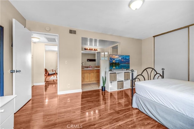 1821 Pepper St Unit 3, Alhambra, CA 91801 - bedroom featuring light wood finished floors, ensuite bath, and a closet