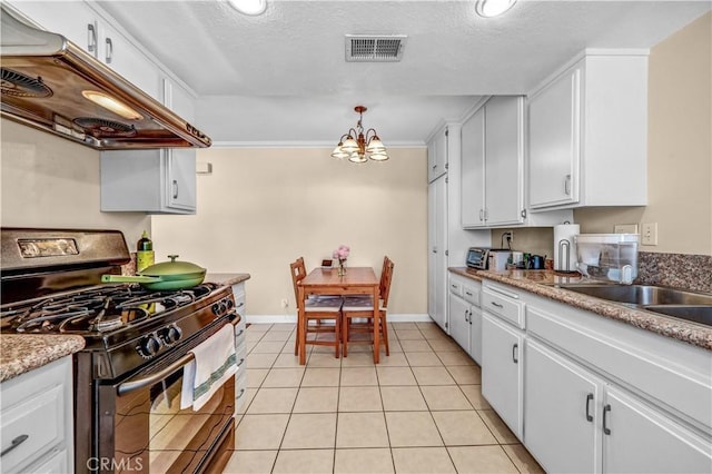 1821 Pepper St Unit 3, Alhambra, CA 91801 - kitchen with black gas stove, custom exhaust hood, a chandelier, white cabinetry, and a textured ceiling