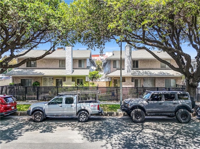1821 Pepper St Unit 3, Alhambra, CA 91801 - view of property featuring stucco siding and a chimney