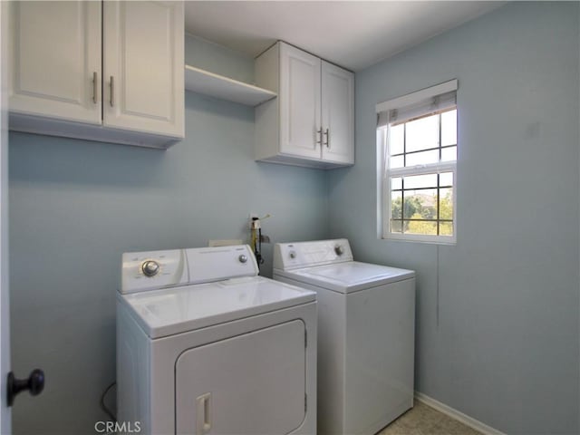 11961 Limestone Ct, Yucaipa, CA 92399 - laundry area with cabinet space and washing machine and clothes dryer