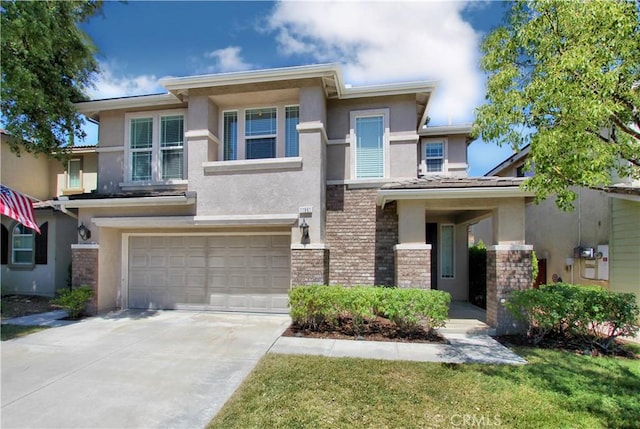 11961 Limestone Ct, Yucaipa, CA 92399 - prairie-style house with stucco siding, a garage, driveway, and stone siding
