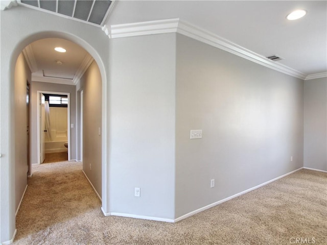 11961 Limestone Ct, Yucaipa, CA 92399 - corridor featuring carpet flooring, arched walkways, crown molding, and recessed lighting