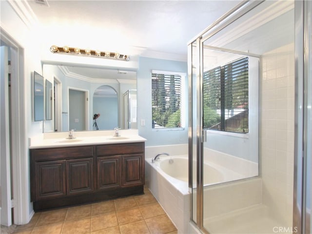 11961 Limestone Ct, Yucaipa, CA 92399 - full bathroom featuring a shower stall, double vanity, a bath, tile patterned flooring, and crown molding