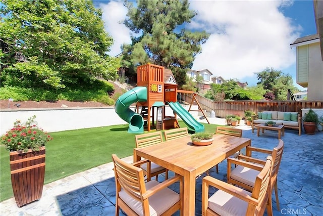 11961 Limestone Ct, Yucaipa, CA 92399 - view of jungle gym with an outdoor hangout area, a patio, and outdoor dining space
