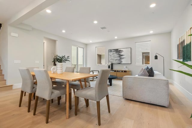 3584 Garfield St, Carlsbad, CA 92008 - dining area featuring light wood finished floors, recessed lighting, and stairway